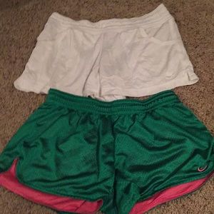 2 pair of Nike shorts size Med